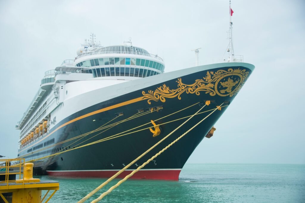 Elegant cruise ship docked at the harbor, featuring intricate design and vacation vibes.